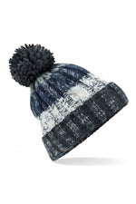 Corkscrew pom pom beanie