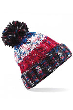 Corkscrew pom pom beanie